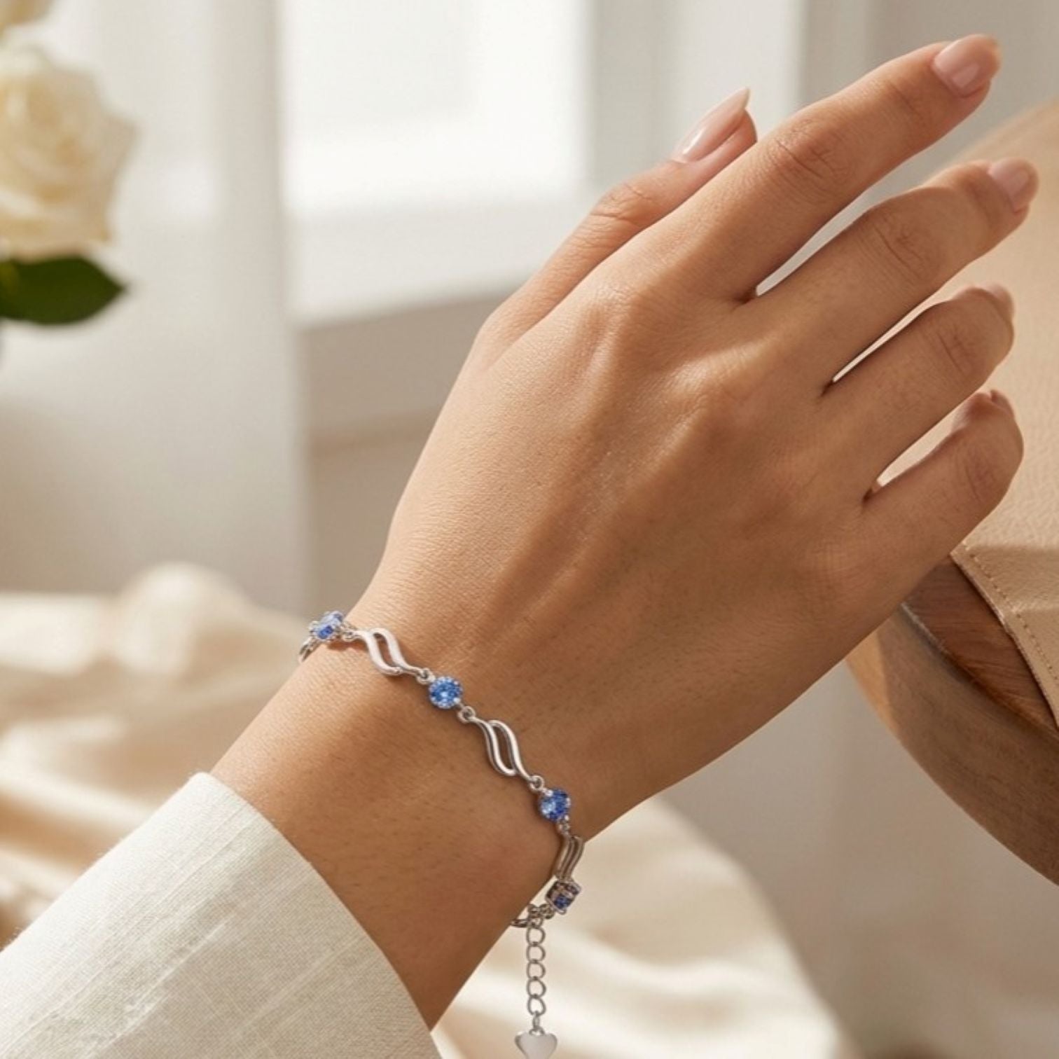 Armband (925K) met blauw strass steentje